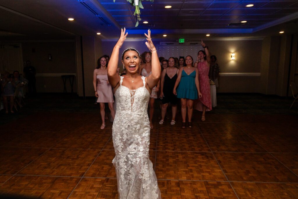 a woman in a white dress on a dance floor