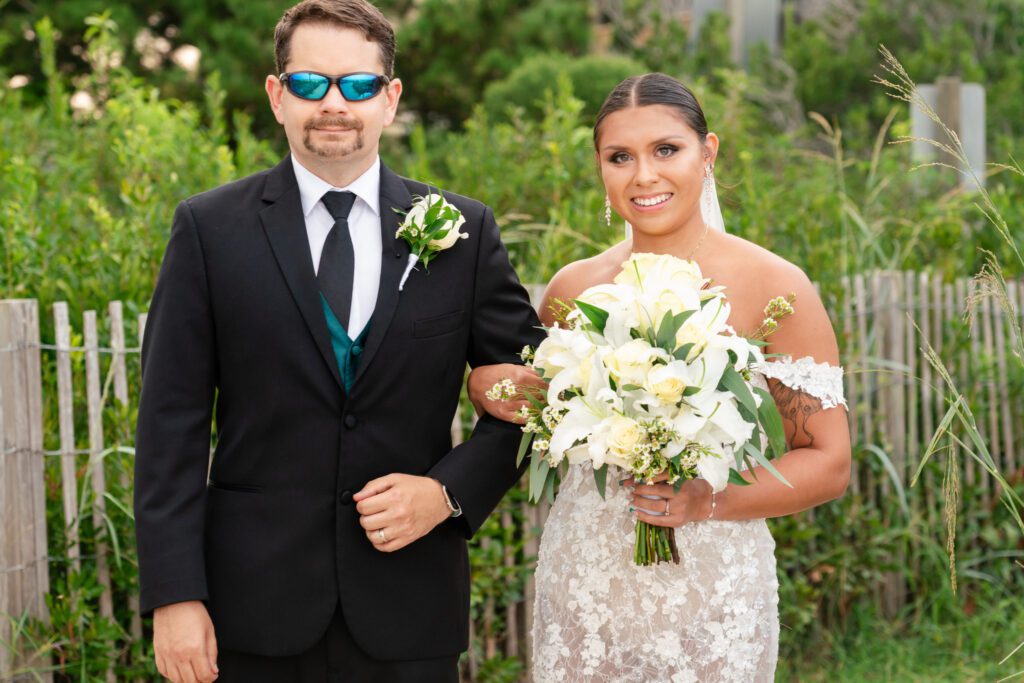 a bride and groom standing next to each other