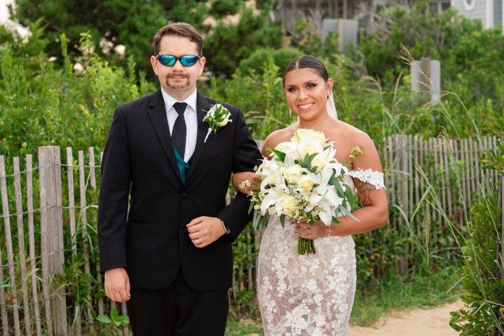 a bride and groom are posing for a photo