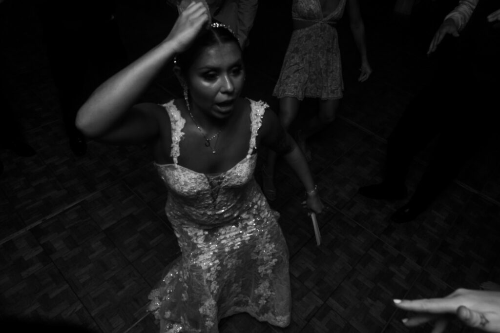a woman in a dress is dancing on the floor