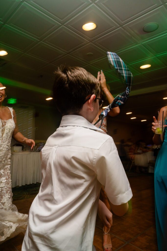 a man and woman dancing on a dance floor