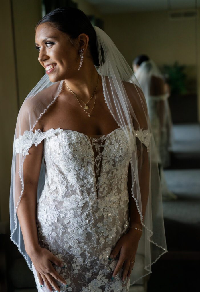 a woman in a wedding dress and veil