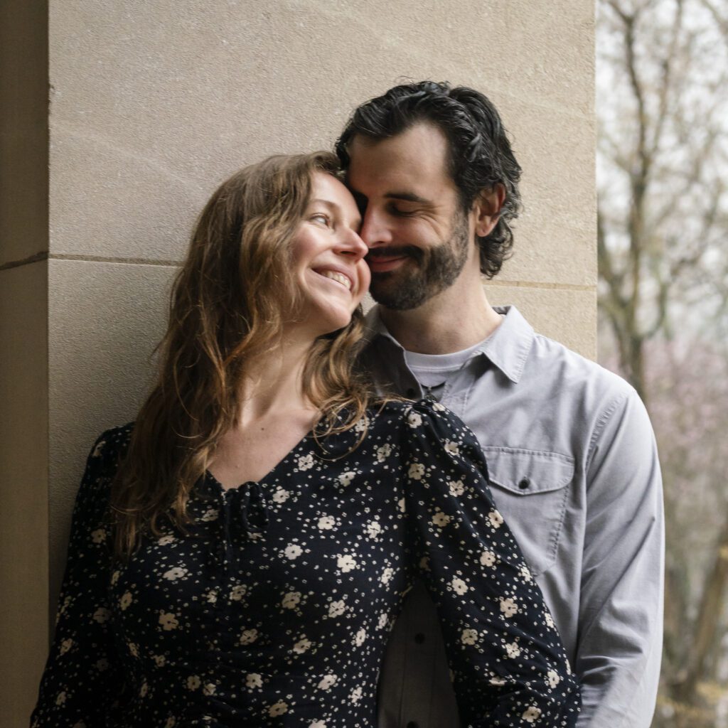 a man and woman standing next to each other